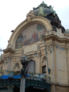 front of Municipal House, with "Homage to Prague" mosaic