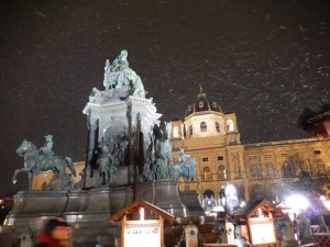 Christmas market around the Maria Theresa Monument in the snow