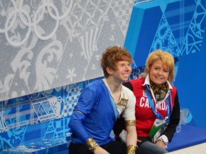 Candian Kevin Reynolds waiting with his coach for results (he finished 15th)
